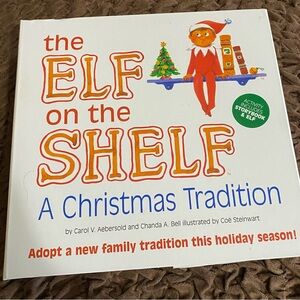 The Elf on the Shelf: A Christmas Tradition Book with the Elf in a case